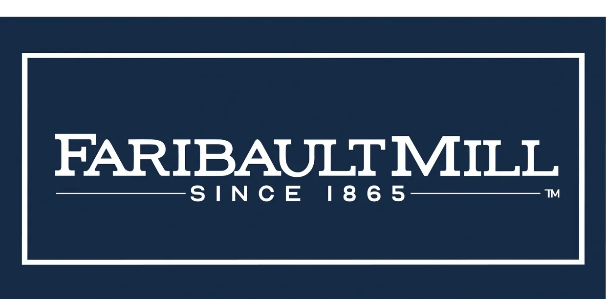 Logo of Tribault Mill, established in 1865.
