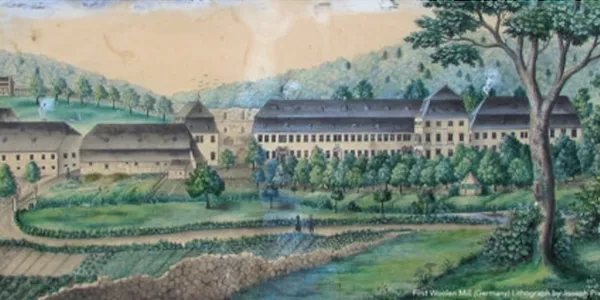 Watercolor painting of a village with buildings and greenery.